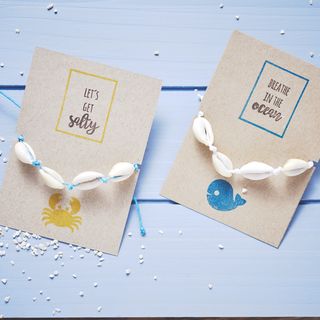 Bracciale in conchiglia con chiusura macramé