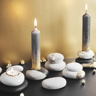 Steine als Kerzenhalter