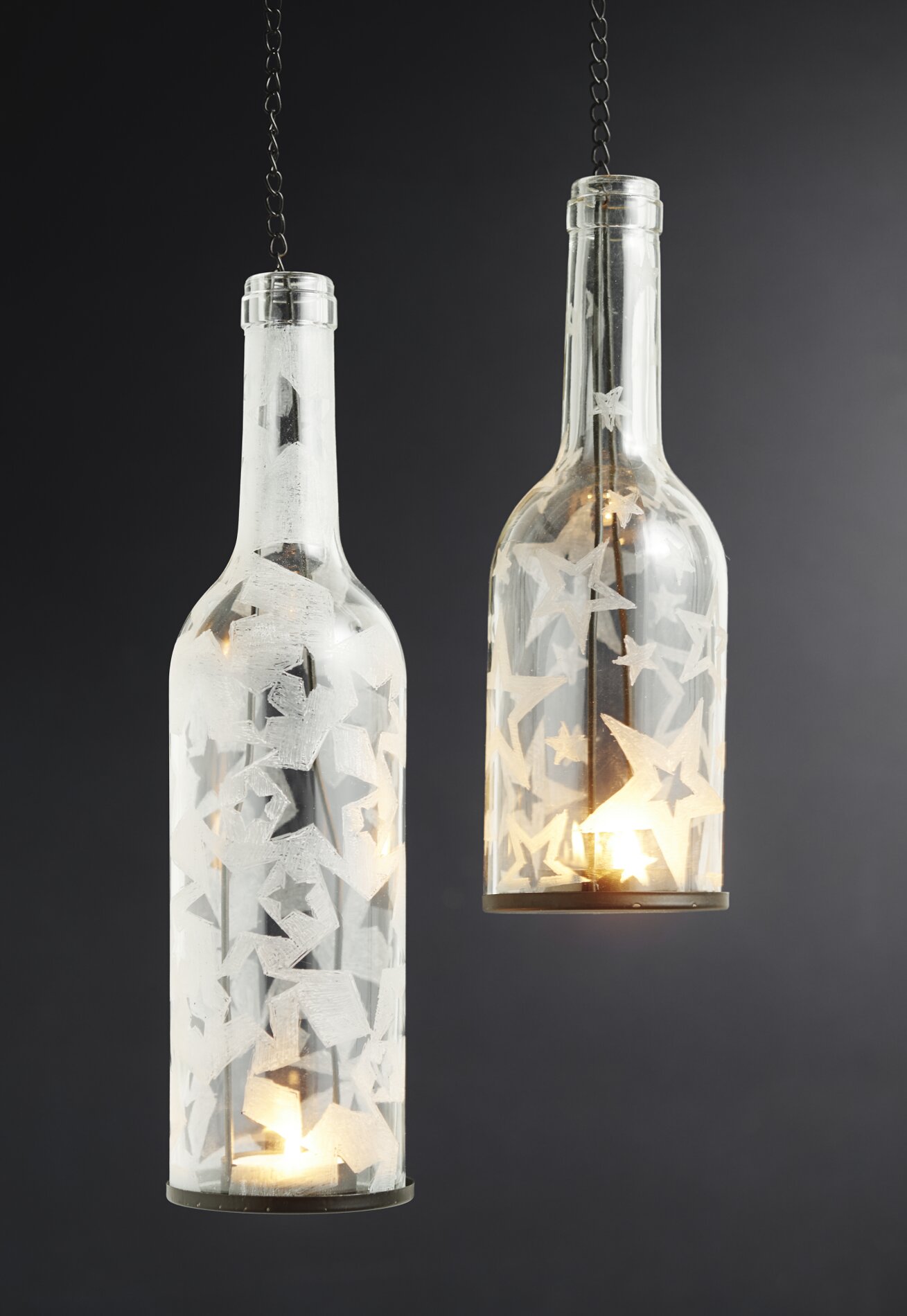Windlichtflaschen mit Sternenmotiv gravieren