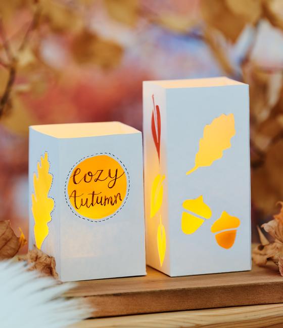 Dekorative Windlichte mit Papercut Motiven