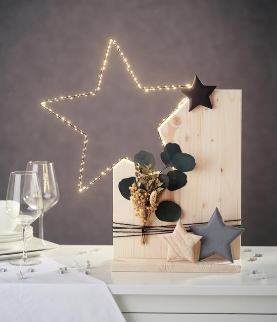 stern auf holzsockel