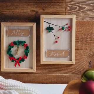 Holzrahmen mit Qullingmotiven