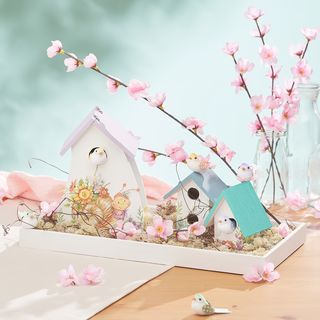 Vogelhäuser mit geprägten Serviettenmotiven