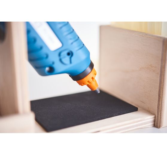 Hot glue gun with holder